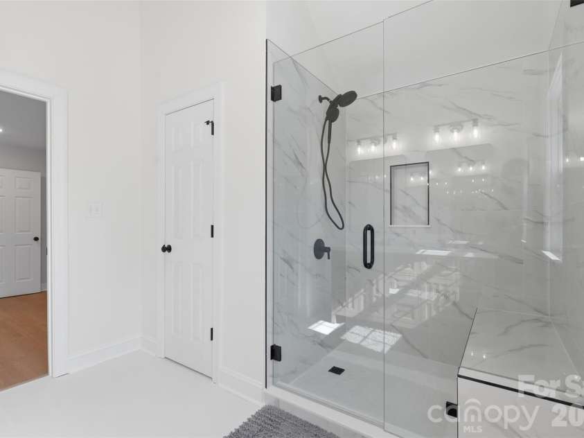 7332 Bailywick Drive, Waxhaw, NC 28173.  MLS# CAR4365077, YatesRealty ID 18528. New walk in tile shower and glass
