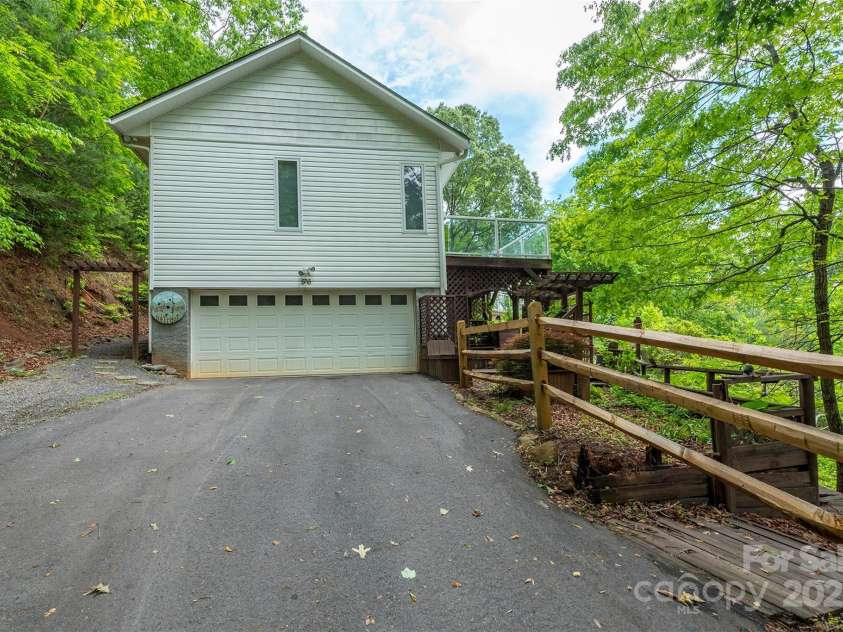 56 Great Horned Owl Road, Candler, NC 28715.  MLS# CAR4255204, YatesRealty ID 18529. 