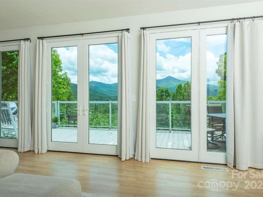 56 Great Horned Owl Road, Candler, NC 28715.  MLS# CAR4255204, YatesRealty ID 18529. 