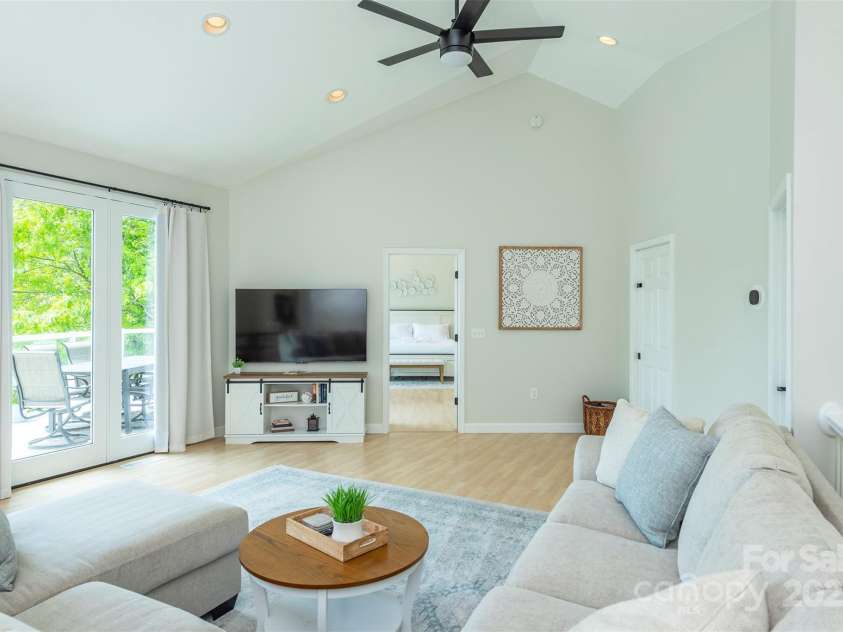 56 Great Horned Owl Road, Candler, NC 28715.  MLS# CAR4255204, YatesRealty ID 18529. Light and Bright Living Room