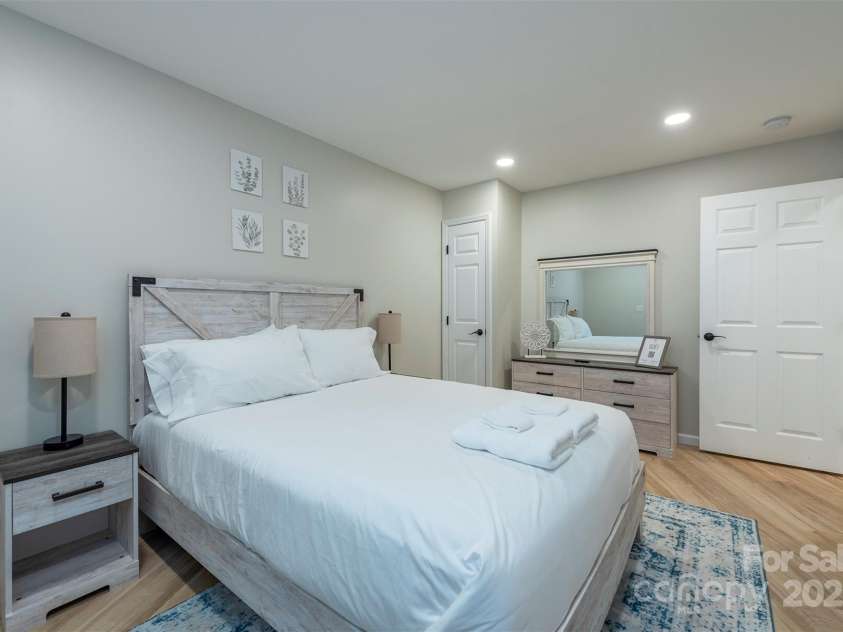 56 Great Horned Owl Road, Candler, NC 28715.  MLS# CAR4255204, YatesRealty ID 18529. Lower Level Bonus Room