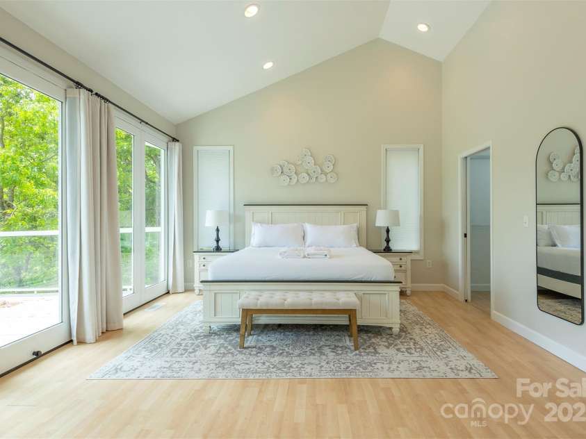 56 Great Horned Owl Road, Candler, NC 28715.  MLS# CAR4255204, YatesRealty ID 18529. Main Floor Primary Suite #1