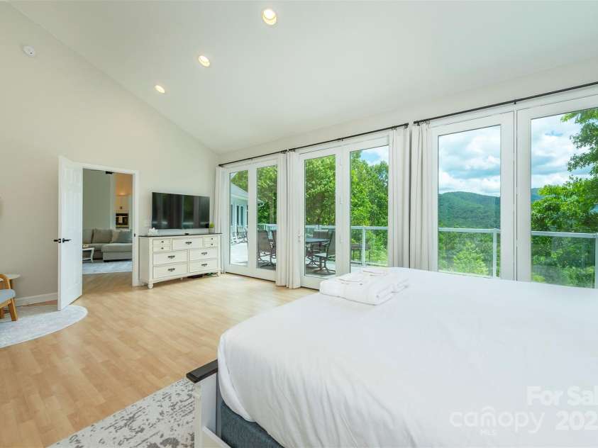 56 Great Horned Owl Road, Candler, NC 28715.  MLS# CAR4255204, YatesRealty ID 18529. Suite #1