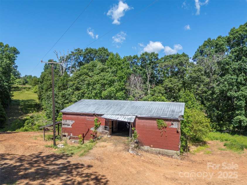 983 Stroud Road, Ellenboro, NC 28040.  MLS# CAR4263723, YatesRealty ID 18532. Note: Old barn is collapsing.