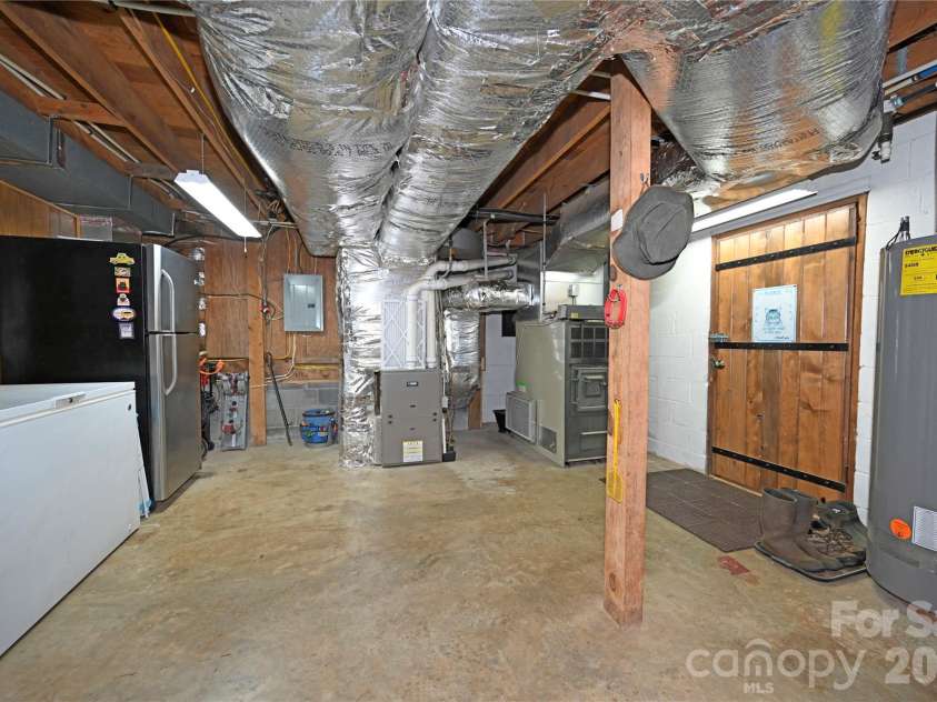 550 Joe Payne Road, Marshall, NC 28753.  MLS# CAR4257370, YatesRealty ID 18535. Basement