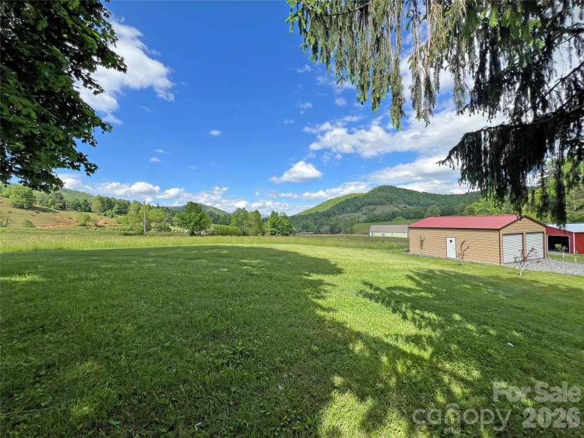 550 Joe Payne Road, Marshall, NC 28753.  MLS# CAR4257370, YatesRealty ID 18535. Garage and barn