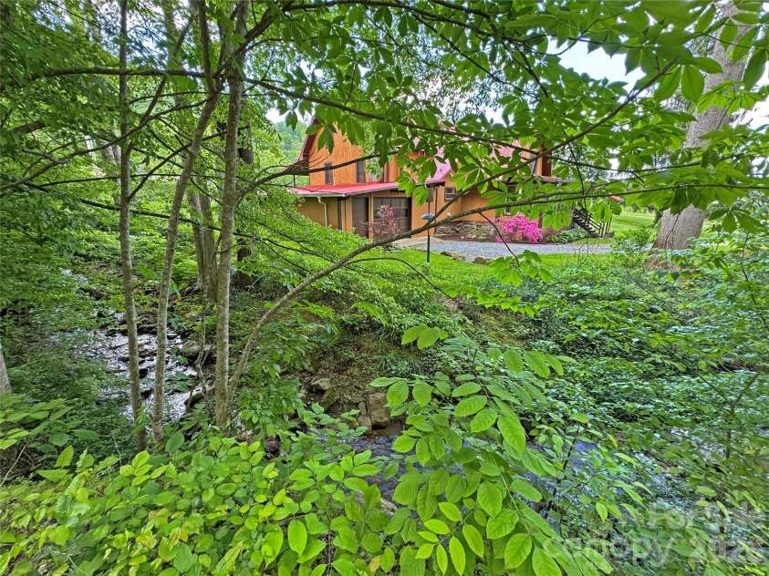 550 Joe Payne Road, Marshall, NC 28753.  MLS# CAR4257370, YatesRealty ID 18535. Peaceful Creekside Farm!