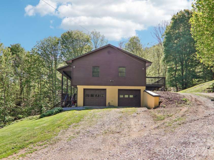 129 Cash Phillips Drive, Mars Hill, NC 28754.  MLS# CAR4371101, YatesRealty ID 18538. Double Garage W/ New Doors