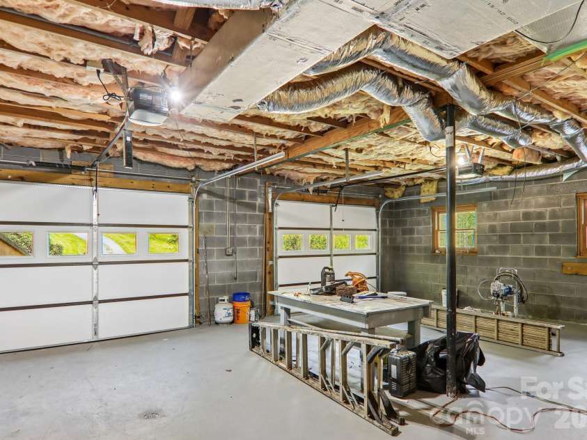 129 Cash Phillips Drive, Mars Hill, NC 28754.  MLS# CAR4371101, YatesRealty ID 18538. Garage/ New Doors and Openers