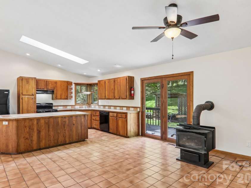 129 Cash Phillips Drive, Mars Hill, NC 28754.  MLS# CAR4371101, YatesRealty ID 18538. Wormy Chestnut Custom Cabinets