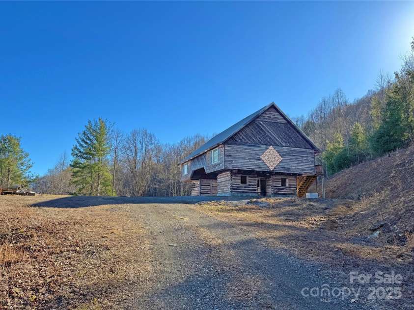 1201 & 1540 Baker Branch Lane, Marshall, NC 28753.  MLS# CAR4220175, YatesRealty ID 18539. Barn Constructed of Historic Logs with Loft Apartment