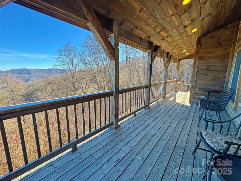 1201 & 1540 Baker Branch Lane, Marshall, NC 28753.  MLS# CAR4220175, YatesRealty ID 18539. Cabin Porch Overlooking View