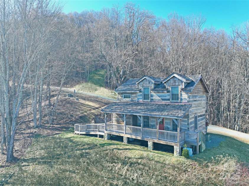 1201 & 1540 Baker Branch Lane, Marshall, NC 28753.  MLS# CAR4220175, YatesRealty ID 18539. Hand Hewn Log Cabin