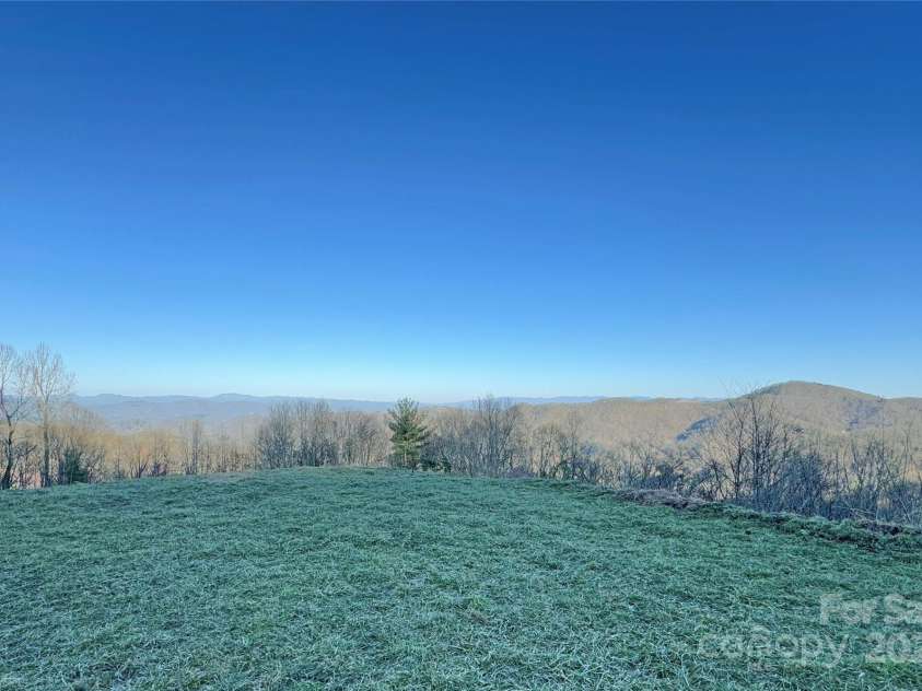 1201 & 1540 Baker Branch Lane, Marshall, NC 28753.  MLS# CAR4220175, YatesRealty ID 18539. Standing at the Barn