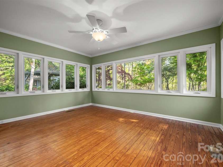 176 Fox Run Lane, Tryon, NC 28782.  MLS# CAR4359459, YatesRealty ID 18539. Sun room