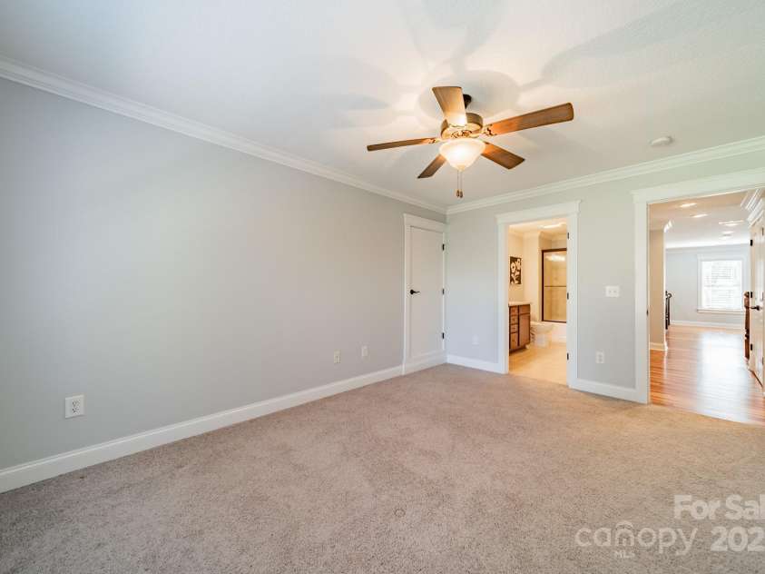 165 Blue Ridge Trail, Mooresville, NC 28117.  MLS# CAR4225294, YatesRealty ID 18540. Bedroom 2 with ensuite bath.