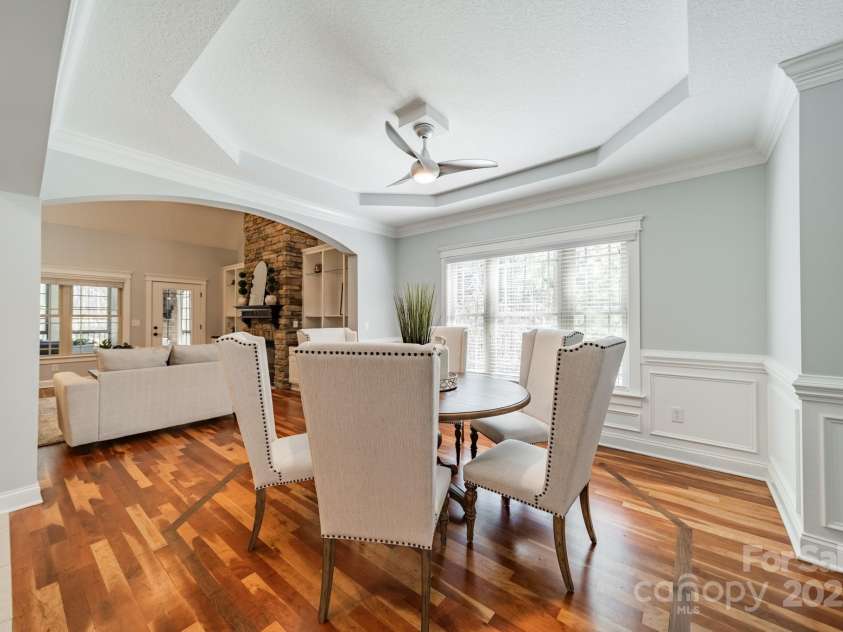 165 Blue Ridge Trail, Mooresville, NC 28117.  MLS# CAR4225294, YatesRealty ID 18540. Dining room open to the 2 story great room, kitchen and breakfast room.