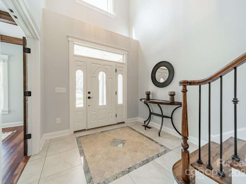 165 Blue Ridge Trail, Mooresville, NC 28117.  MLS# CAR4225294, YatesRealty ID 18540. Entrance in the 2 story foyer.