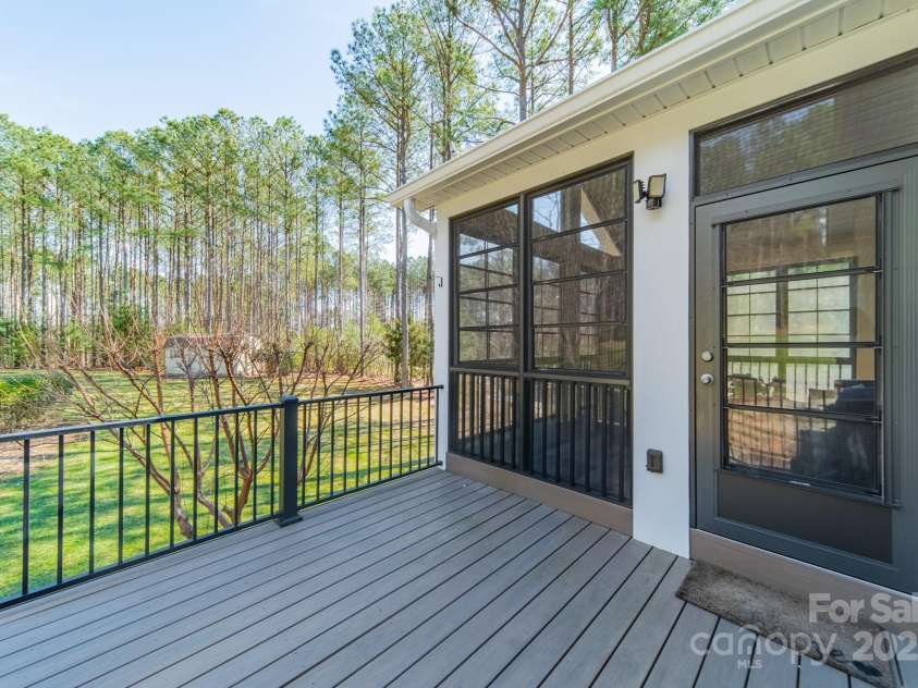 165 Blue Ridge Trail, Mooresville, NC 28117.  MLS# CAR4225294, YatesRealty ID 18540. Exterior patio and backyard.
