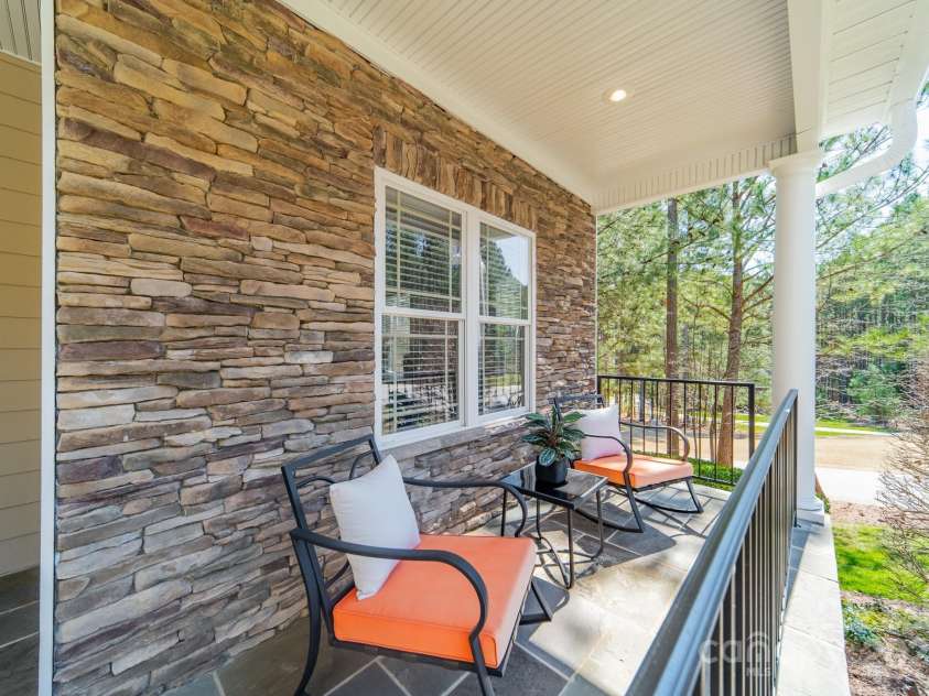 165 Blue Ridge Trail, Mooresville, NC 28117.  MLS# CAR4225294, YatesRealty ID 18540. Large covered front porch to enjoy the day.