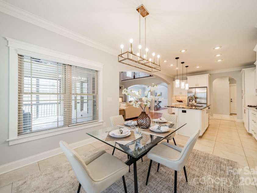 165 Blue Ridge Trail, Mooresville, NC 28117.  MLS# CAR4225294, YatesRealty ID 18540. Light and Bright breakfast area open to the kitchen and great room.