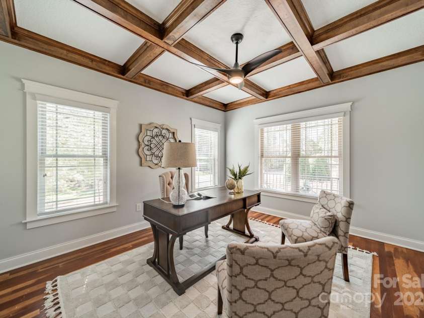 165 Blue Ridge Trail, Mooresville, NC 28117.  MLS# CAR4225294, YatesRealty ID 18540. Office has multiple windows, Brazilian hardwood flooring and french doors for privacy.