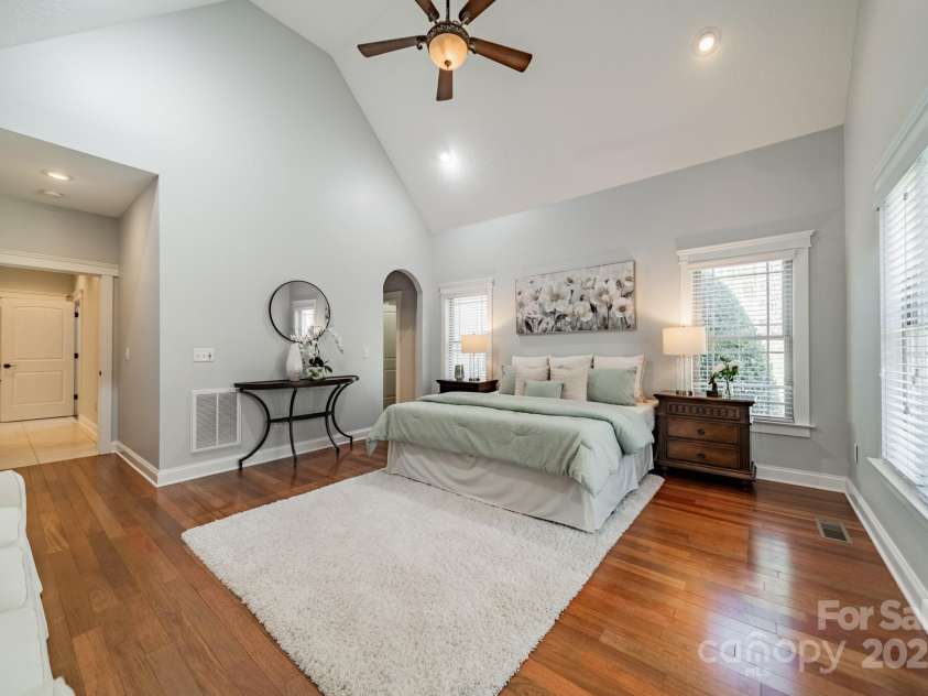 165 Blue Ridge Trail, Mooresville, NC 28117.  MLS# CAR4225294, YatesRealty ID 18540. Primary Bedroom with vaulted ceilings and fan.
