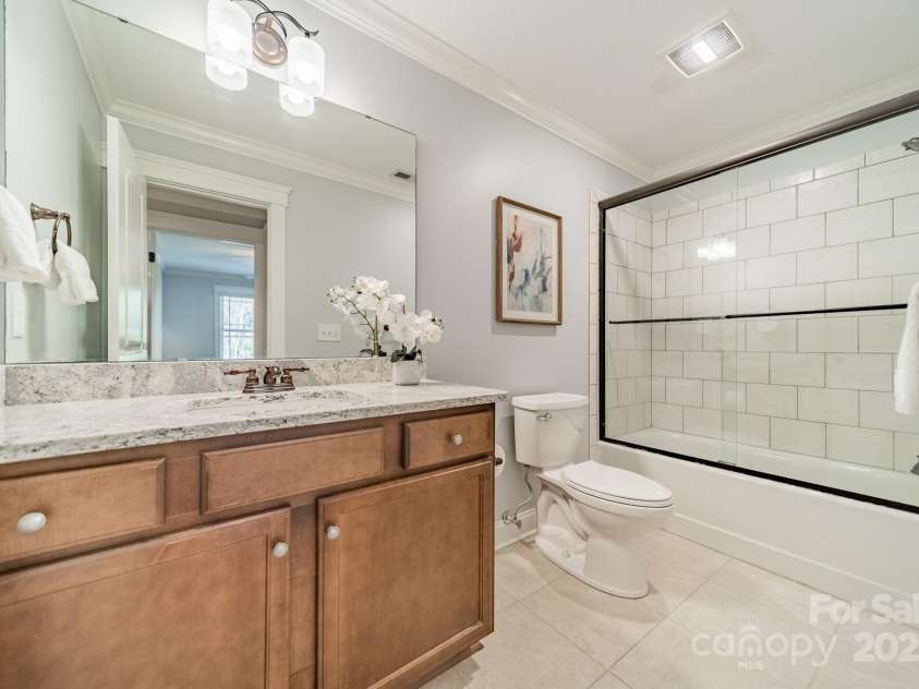 165 Blue Ridge Trail, Mooresville, NC 28117.  MLS# CAR4225294, YatesRealty ID 18540. Upstairs hallway full bath with quartz counters.