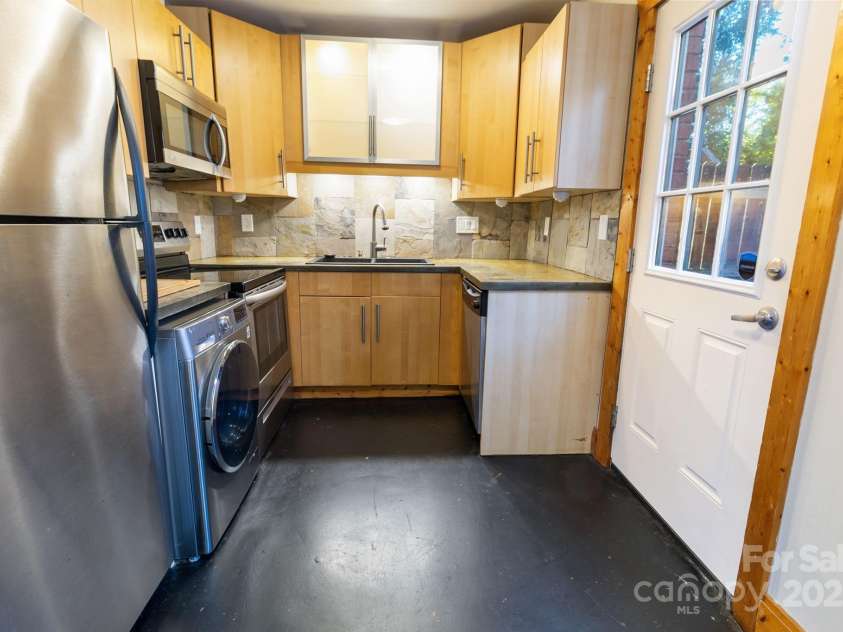 638 Chipley Avenue, Charlotte, NC 28205.  MLS# CAR4327228, YatesRealty ID 18546. Kitchen and back entrance