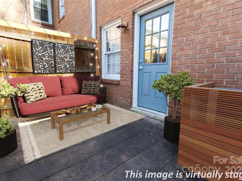 638 Chipley Avenue, Charlotte, NC 28205.  MLS# CAR4327228, YatesRealty ID 18546. Private back patio and entrance with additional parking