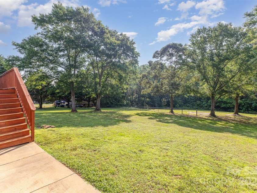 214 Silver Creek Lane, Shelby, NC 28152.  MLS# CAR4266166, YatesRealty ID 18549. Lovely back yard!