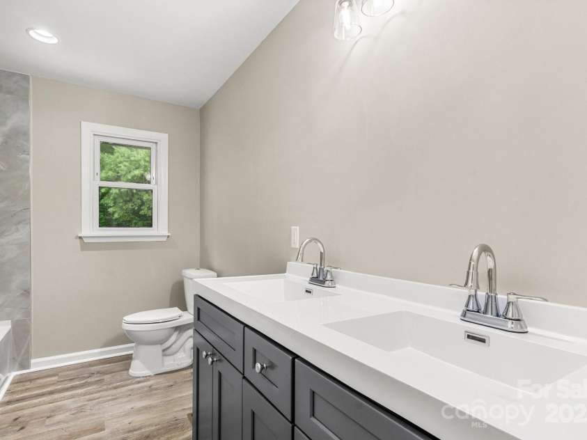 316 Fulton Street, Kings Mountain, NC 28086.  MLS# CAR4260313, YatesRealty ID 18552. Hallway bathroom with double sinks