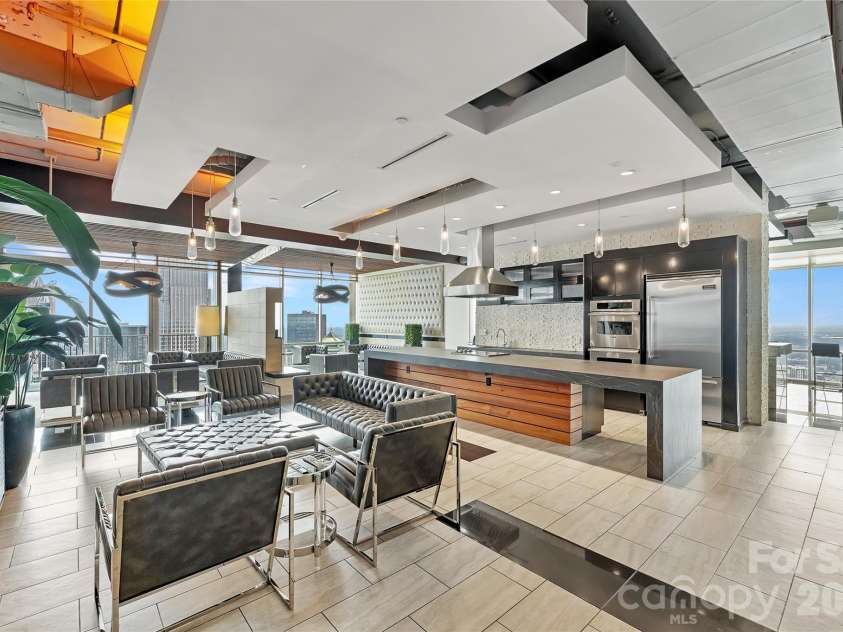 215 Pine Street, Charlotte, NC 28202.  MLS# CAR4186939, YatesRealty ID 18554. 50th floor club room