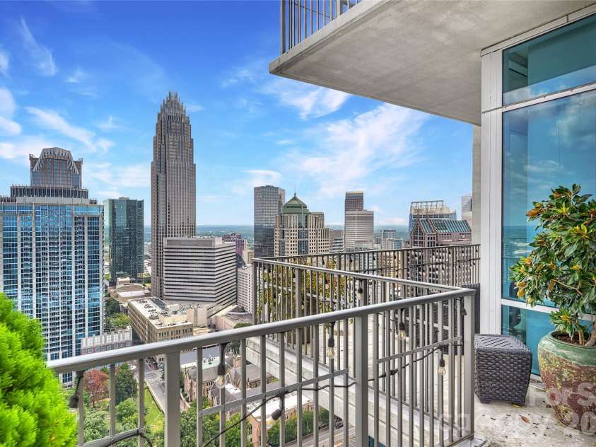 215 Pine Street, Charlotte, NC 28202.  MLS# CAR4186939, YatesRealty ID 18554. Expansive wraparound terrace