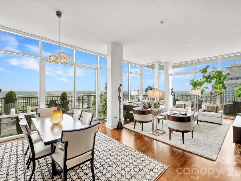 215 Pine Street, Charlotte, NC 28202.  MLS# CAR4186939, YatesRealty ID 18554. Floor-to-ceiling glass framing Uptown Charlotte