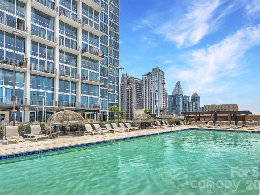 215 Pine Street, Charlotte, NC 28202.  MLS# CAR4186939, YatesRealty ID 18554. Junior Olympic-sized pool