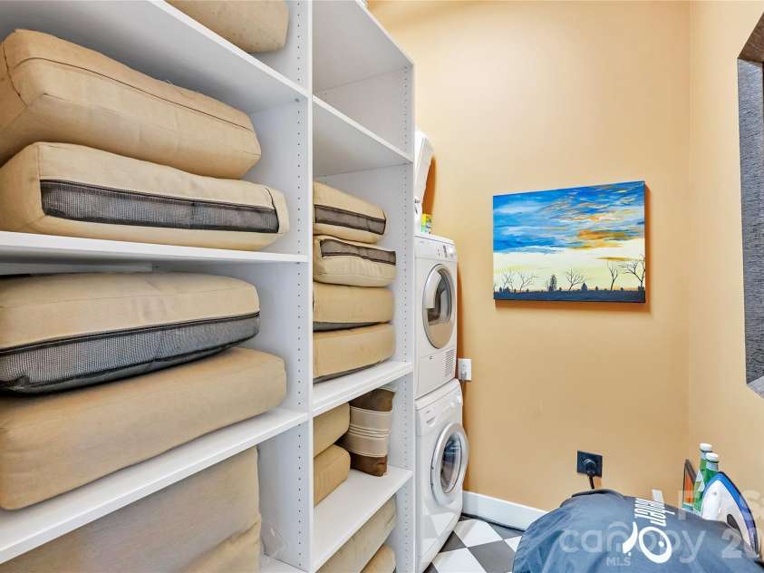 215 Pine Street, Charlotte, NC 28202.  MLS# CAR4186939, YatesRealty ID 18554. Laundry room with additional storage.
