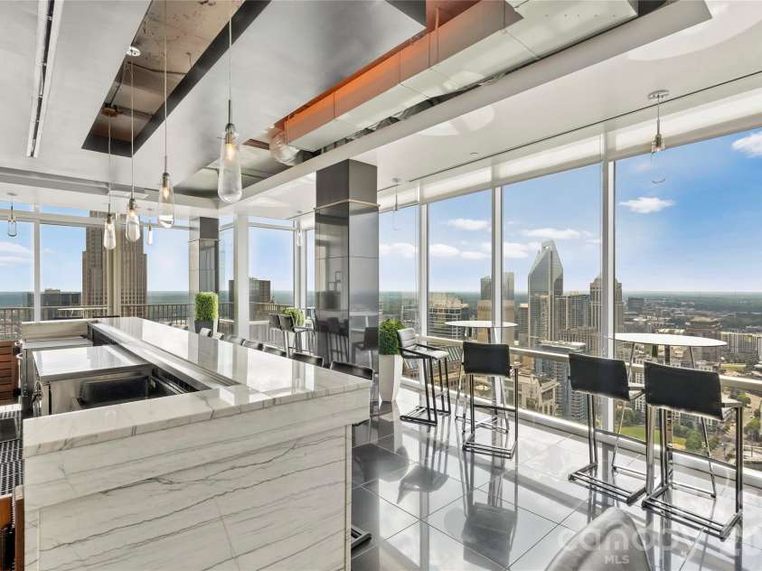 215 Pine Street, Charlotte, NC 28202.  MLS# CAR4186939, YatesRealty ID 18554. Private Sky Lounge overlooking the city