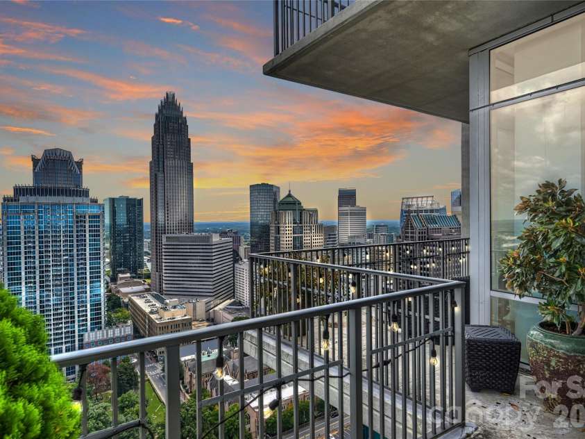 215 Pine Street, Charlotte, NC 28202.  MLS# CAR4186939, YatesRealty ID 18554. Sunset from your wraparound terrace
