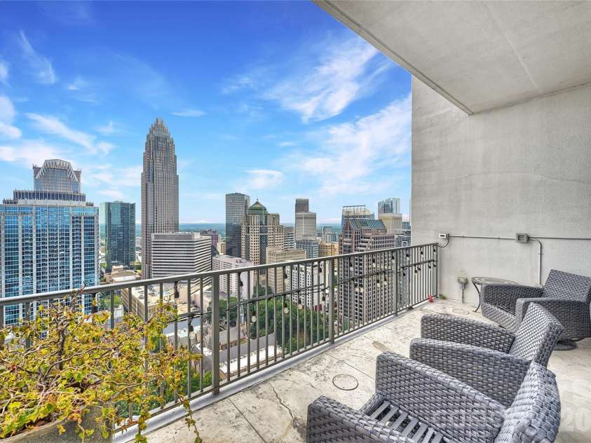 215 Pine Street, Charlotte, NC 28202.  MLS# CAR4186939, YatesRealty ID 18554. Wrap around covered sitting area with direct city views