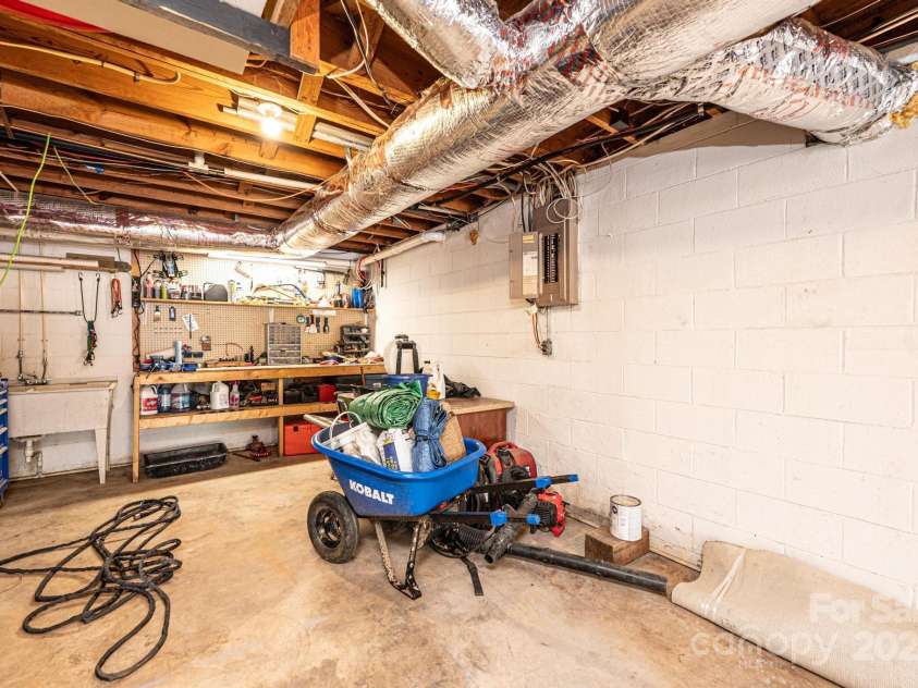 651 25th Avenue, Hickory, NC 28601.  MLS# CAR4233681, YatesRealty ID 18559. Basement Workshop