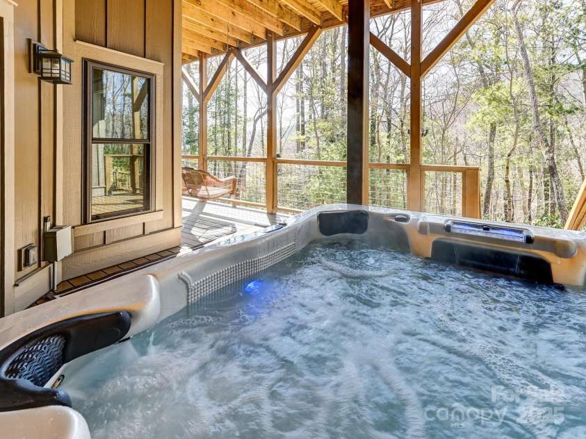 29 Stills Creek Loop, Fairview, NC 28730.  MLS# CAR4226327, YatesRealty ID 18560. Swing or Soak - The Choice is Yours....