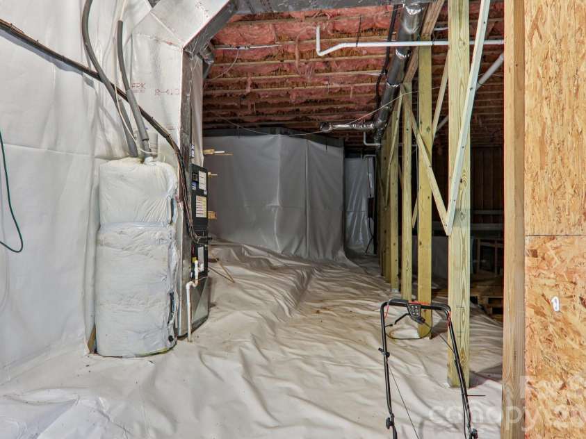 702 Cinnamon Way, Flat Rock, NC 28731.  MLS# CAR4373654, YatesRealty ID 18560. Huge encapsulated crawl space for storage