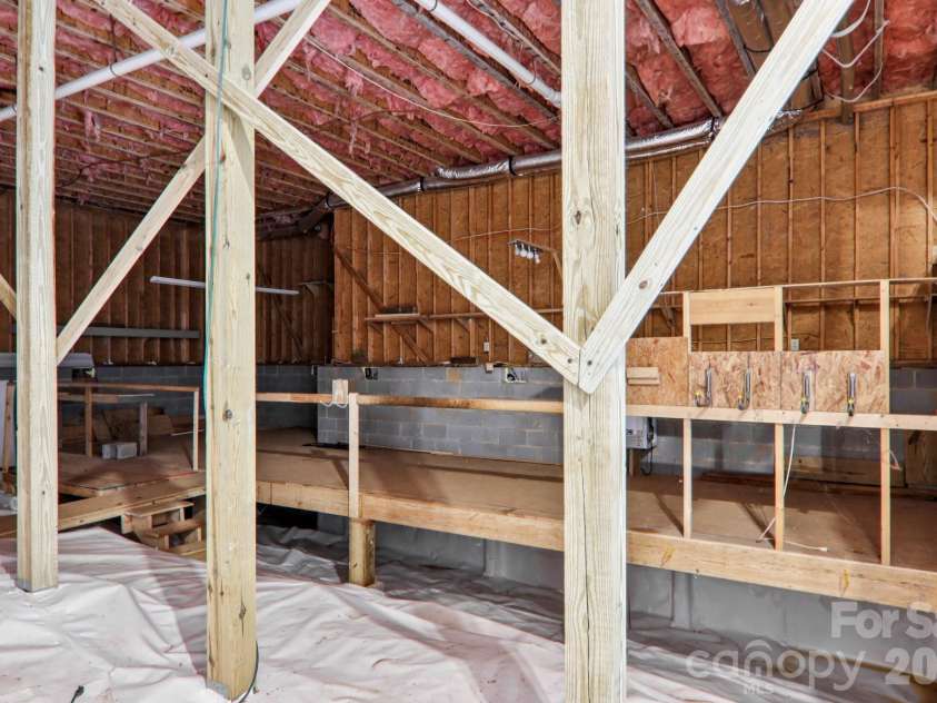 702 Cinnamon Way, Flat Rock, NC 28731.  MLS# CAR4373654, YatesRealty ID 18560. Huge encapsulated crawl space for storage