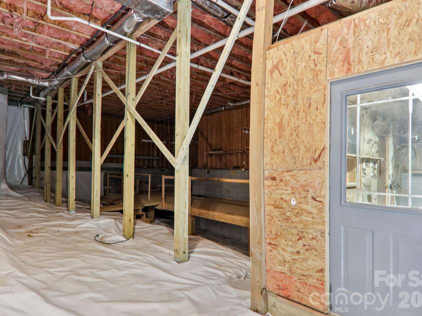 702 Cinnamon Way, Flat Rock, NC 28731.  MLS# CAR4373654, YatesRealty ID 18560. Huge encapsulated crawl space for storage