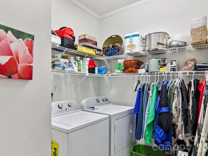 702 Cinnamon Way, Flat Rock, NC 28731.  MLS# CAR4373654, YatesRealty ID 18560. Laundry Room
