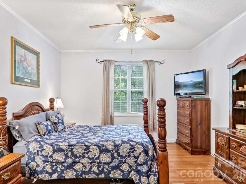 702 Cinnamon Way, Flat Rock, NC 28731.  MLS# CAR4373654, YatesRealty ID 18560. Primary Bedroom