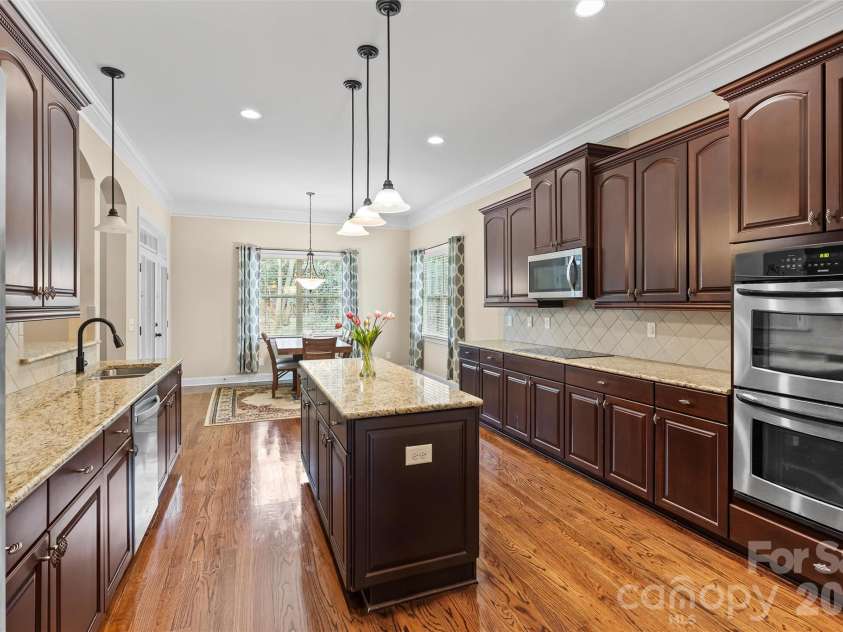 166 Wilson Lake Road, Mooresville, NC 28117.  MLS# CAR4353133, YatesRealty ID 18561. Spacious Open Kitchen and Dining Area