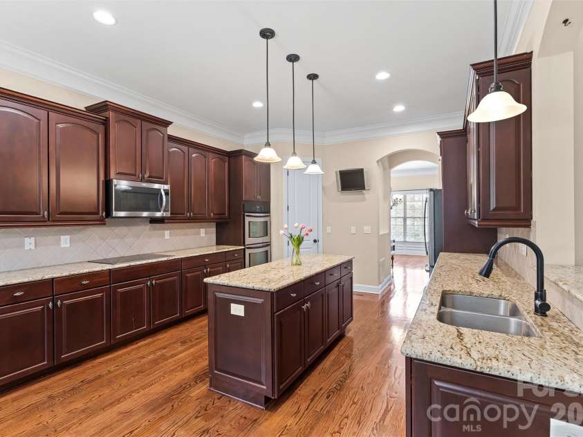 166 Wilson Lake Road, Mooresville, NC 28117.  MLS# CAR4353133, YatesRealty ID 18561. Spacious Open Kitchen and Dining Area 