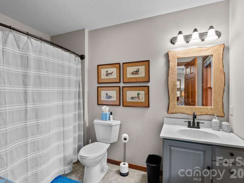 65 Sugar Maple Drive, Mills River, NC 28759.  MLS# CAR4357301, YatesRealty ID 18562. Ensuite bath for Bedroom #2.